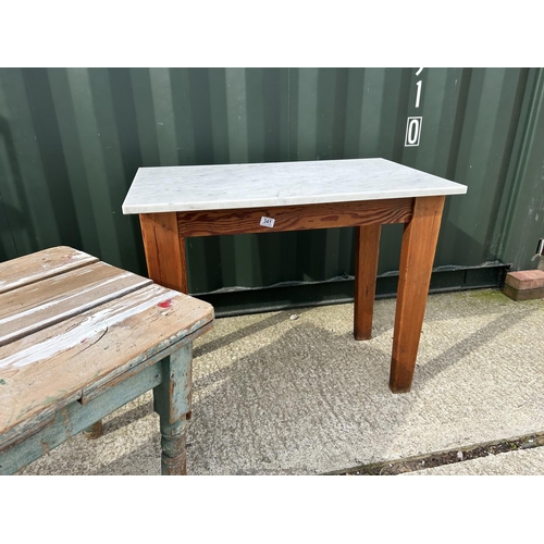 341 - A pine kitchen table with white marble top together with a low rustic pine table