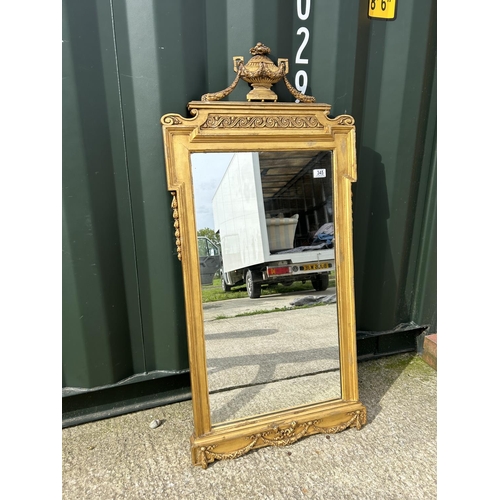 345 - A highly ornate gold gilt wall mirror 61x124