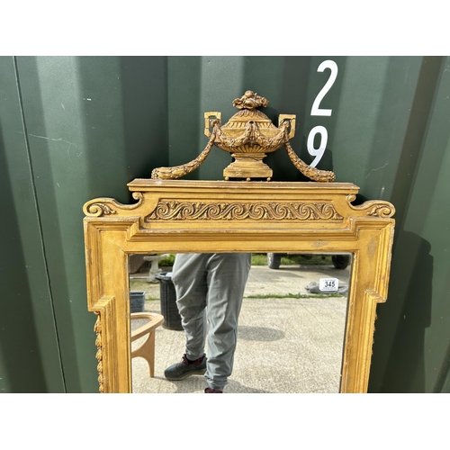 345 - A highly ornate gold gilt wall mirror 61x124