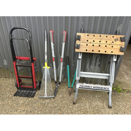 42 - Folding workbench, barrow and three tools