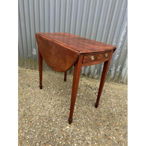 49 - A Victorian drop leaf table with drawer and dummy drawer