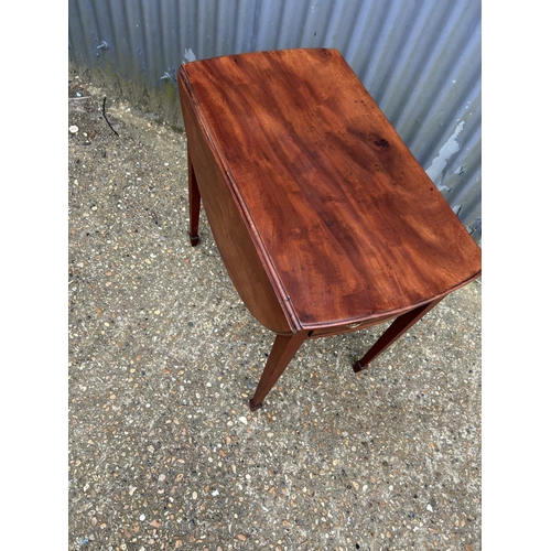 49 - A Victorian drop leaf table with drawer and dummy drawer