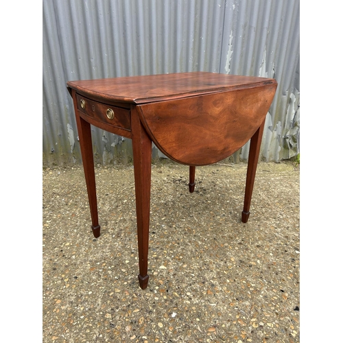 49 - A Victorian drop leaf table with drawer and dummy drawer