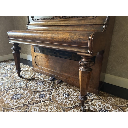 50a - An ornate walnut cased upright Piano by GEORGE BEACHEN London