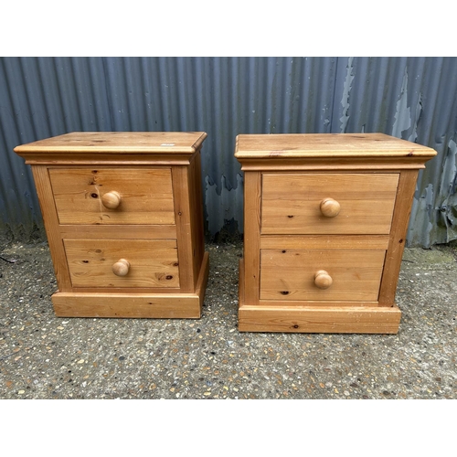 51 - A pair of solid pine two drawer bedsides