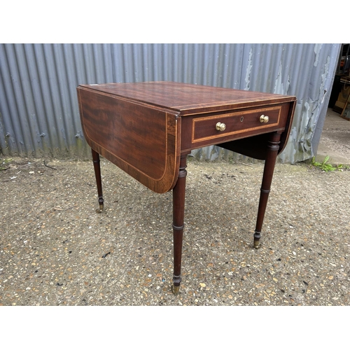 58 - A regency style mahogany drop tea table inlaid with satinwood