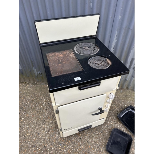 6 - A vintage cream enamel belling electric cooker