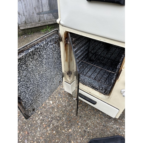 6 - A vintage cream enamel belling electric cooker