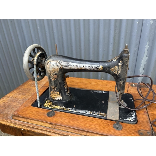 63 - Singer table sewing machine