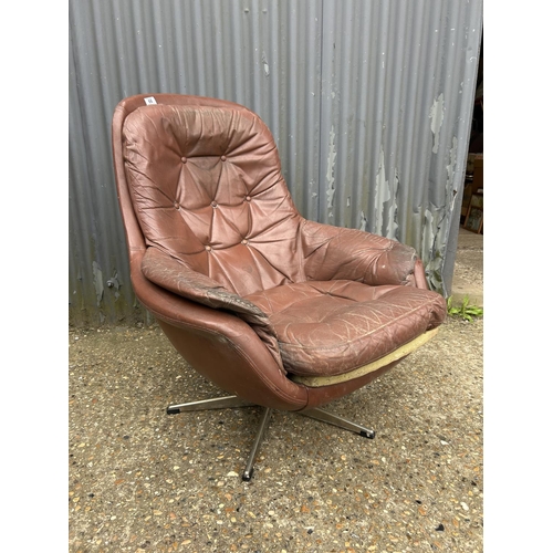 66 - A mid century brown vinyl chair for refurbishment