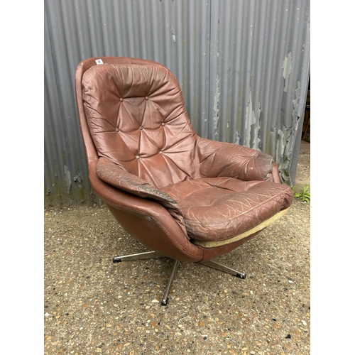 66 - A mid century brown vinyl chair for refurbishment