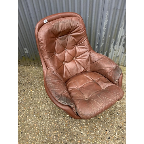 66 - A mid century brown vinyl chair for refurbishment