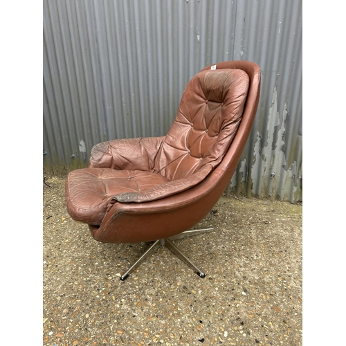 66 - A mid century brown vinyl chair for refurbishment