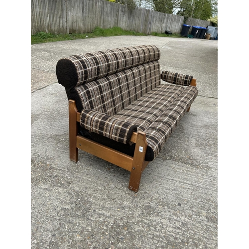 70 - A mid century teak framed daybed sofa