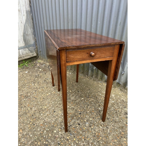 77 - A mahogany Pembroke table with drawer