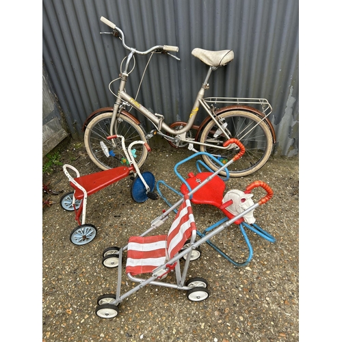 91 - Vintage folding cycle, together with two children's toys and a dolls pram