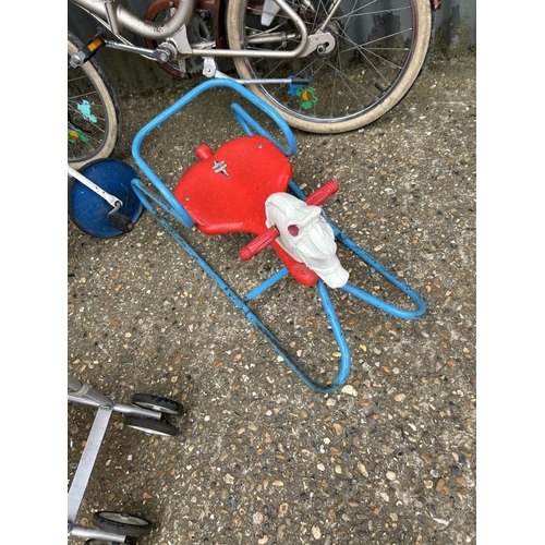 91 - Vintage folding cycle, together with two children's toys and a dolls pram