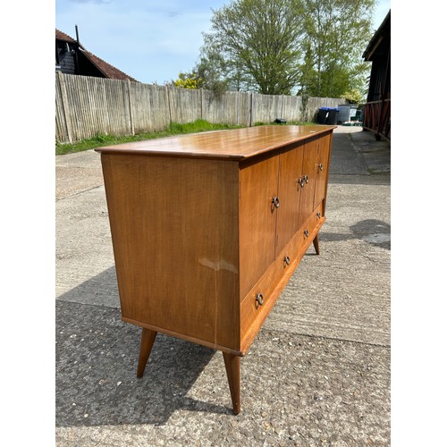 258 - A 1958 Younger sideboard Retailed by HAMPTONS in Chardonnay colour teak 147 x58x88. With original se... 