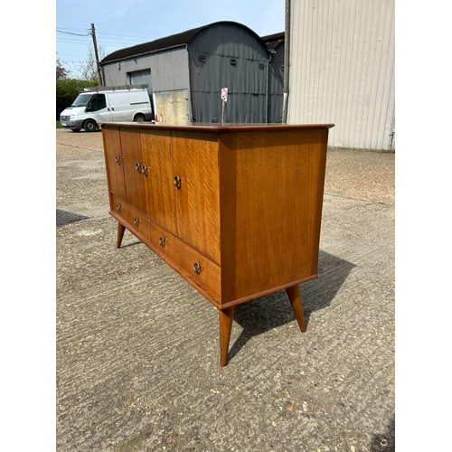 258 - A 1958 Younger sideboard Retailed by HAMPTONS in Chardonnay colour teak 147 x58x88. With original se... 