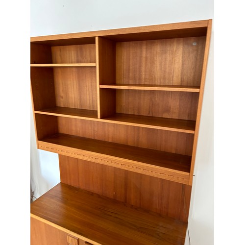 212 - A danish style teak two section lounge wall sideboard both sections having floating tops