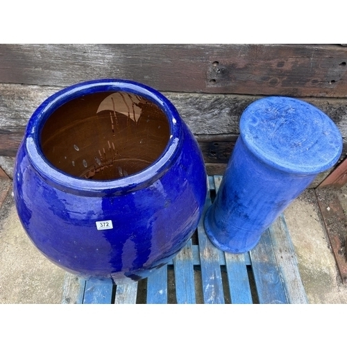 373 - A very large blue glazed garden pot 90cm tall together with a blue glazed pedestal (pedestal with ha... 