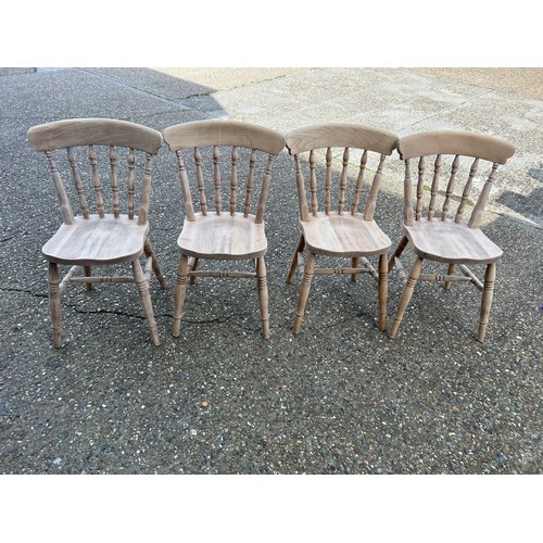 103 - A set of four farmhouse style beech wood chairs