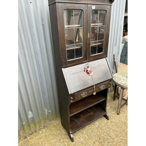 189 - An oak students bureau with leaded glass top