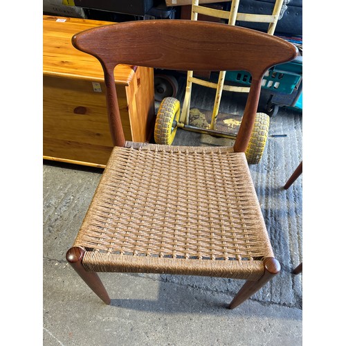 214 - A Danish teak drawer leaf extending dining table 100x100x72 together with three chairs - chairs mark... 