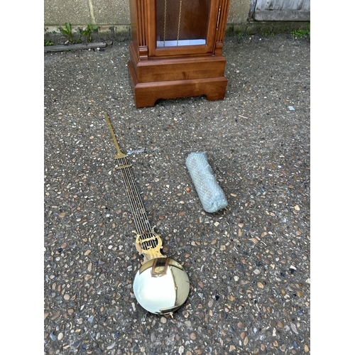 90G - A modern longcase clock by BULOVA with weights and pendulum