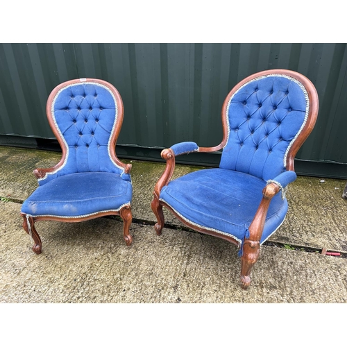 198E - A ladies and gents pair of blue upholstered spoon back salon chairs