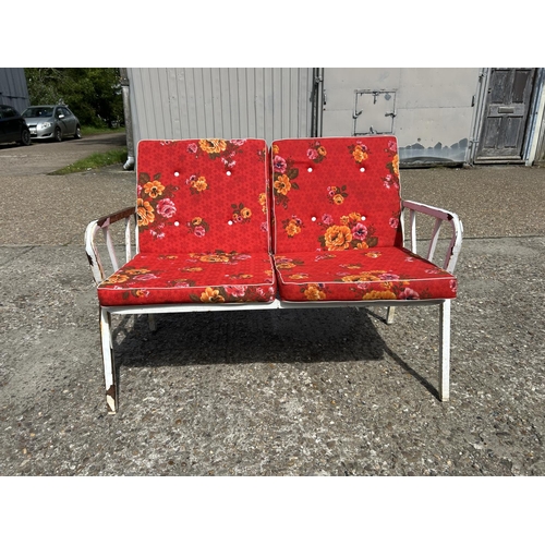 102 - A vintage metal framed two seater garden bench seat