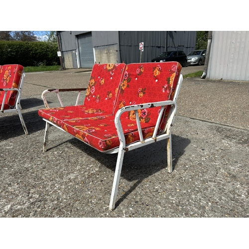 102 - A vintage metal framed two seater garden bench seat