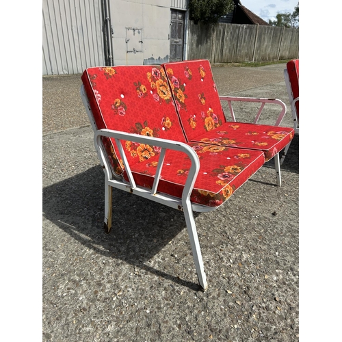 104 - A vintage metal framed two seater garden bench seat