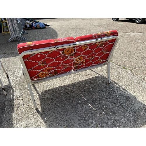 104 - A vintage metal framed two seater garden bench seat