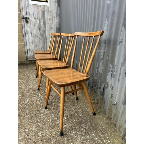 106 - Set of four ercol stick back kitchen chairs