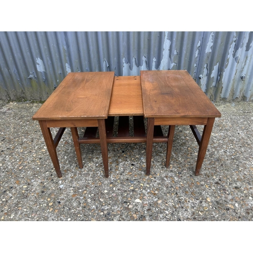 107 - A mid century teak nest of three tables