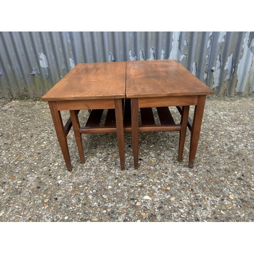 107 - A mid century teak nest of three tables