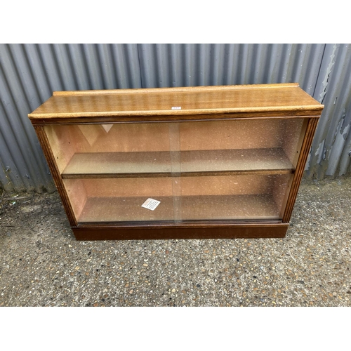 111 - A early 20th century glazed oak bookcase 120x30x80