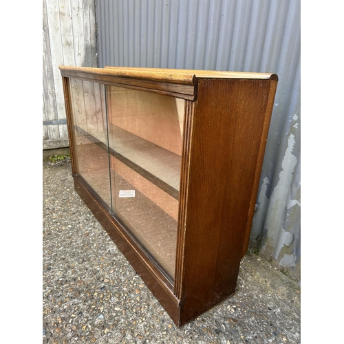 111 - A early 20th century glazed oak bookcase 120x30x80