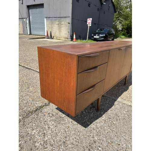 112 - A mid century teak cocktail sideboard by MCINTOSH 202x 46x75