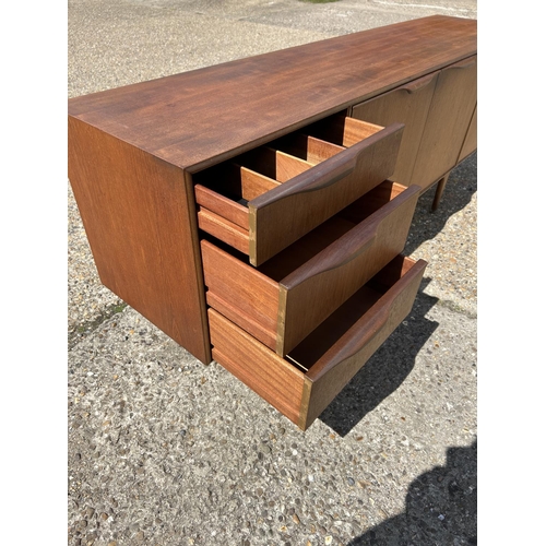 112 - A mid century teak cocktail sideboard by MCINTOSH 202x 46x75