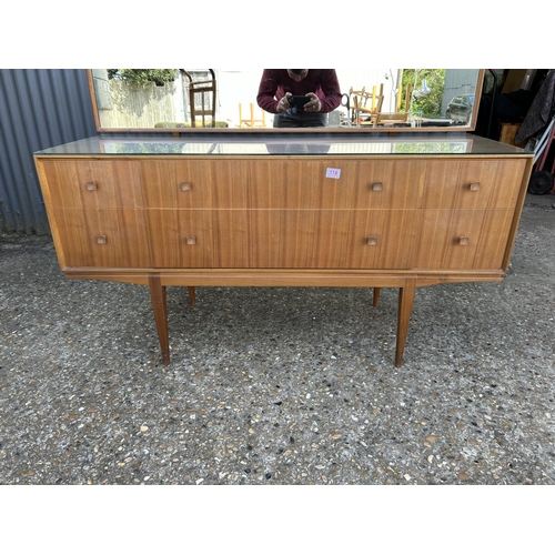 114 - A mid century teak six drawer dressing chest by Mcintosh 138x 48 x 72