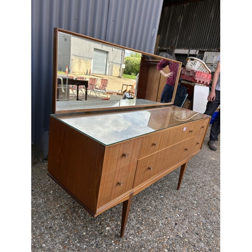 114 - A mid century teak six drawer dressing chest by Mcintosh 138x 48 x 72