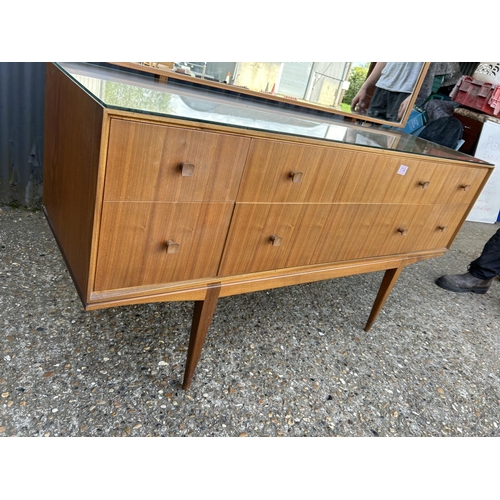 114 - A mid century teak six drawer dressing chest by Mcintosh 138x 48 x 72