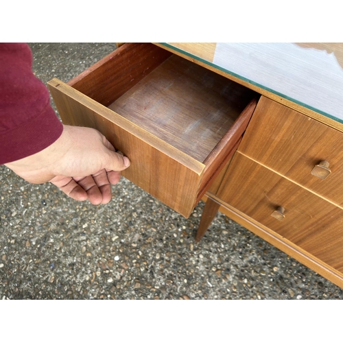 114 - A mid century teak six drawer dressing chest by Mcintosh 138x 48 x 72