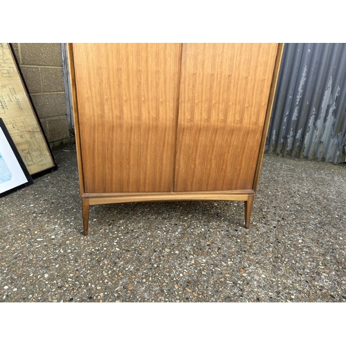 115 - A mid century teak double wardrobe by Mcintosh 90x56x177