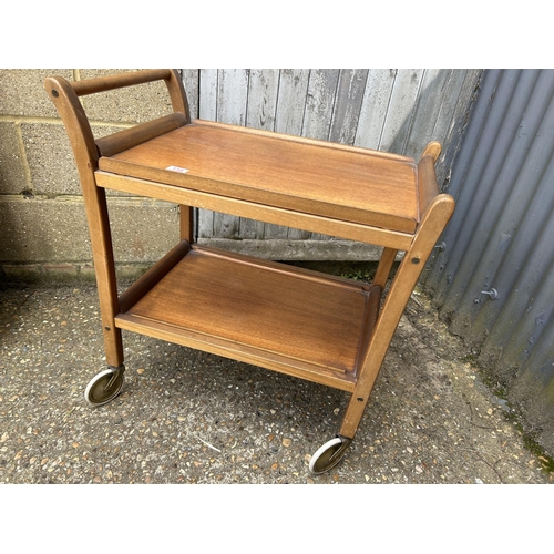 118 - A mid century teak tea trolley