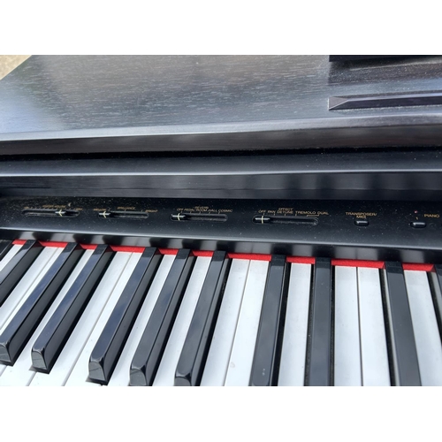 129 - A YAMAHA CLP 670 electric piano / keyboard