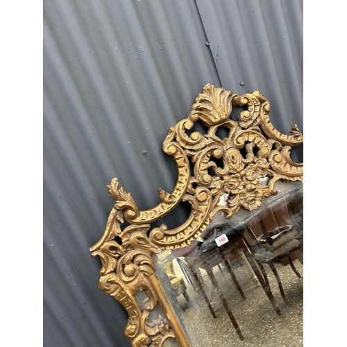 140 - A large gold gilt framed mirror AF 101x150