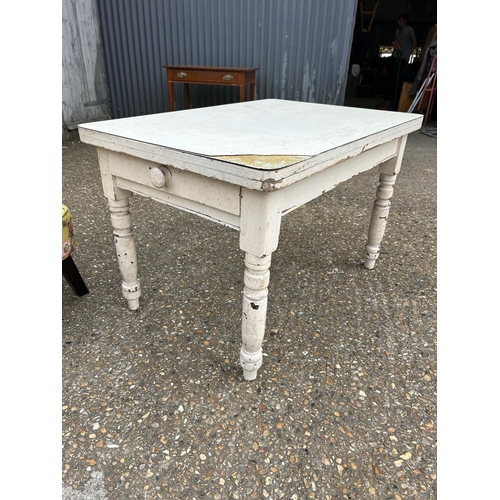 151 - A white painted pine kitchen table with drawer 76x107x70